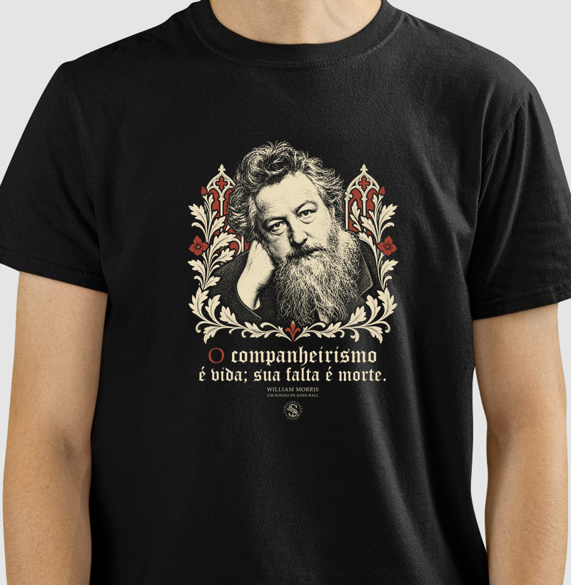 Camiseta preta William Morris — Companheirismo, com retrato e ornamentos, apresentada em modelo vestido.